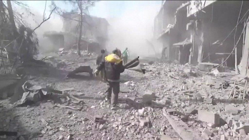 Syrian forces pound rebel enclave