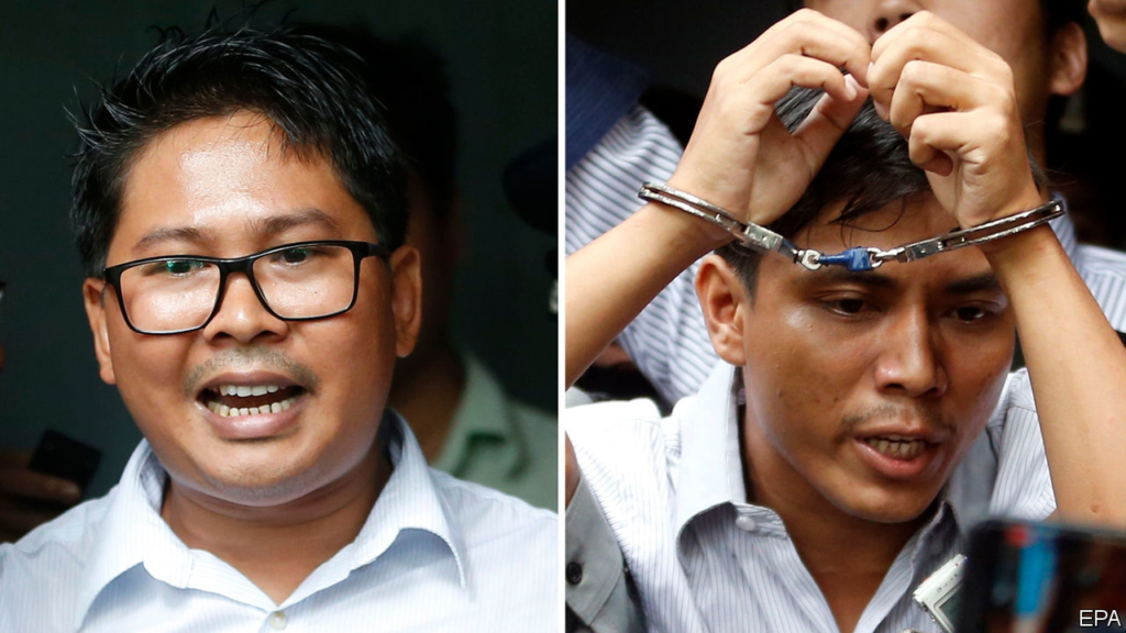 A court in Myanmar jails two reporters for breaking a secrecy law