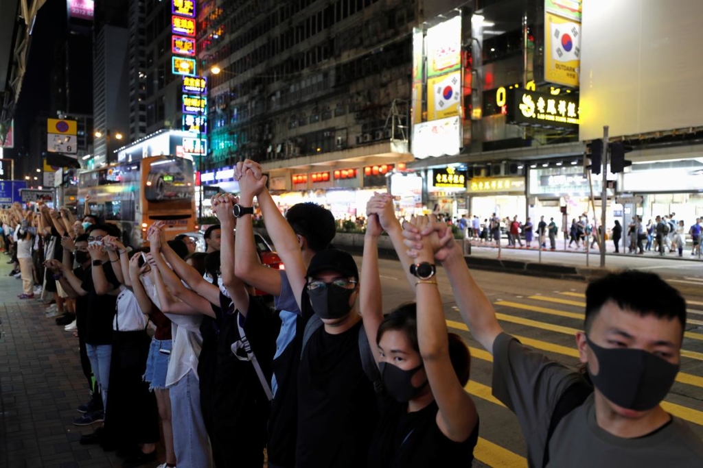 Four Hong Kong stations close to head off protest as China frees UK consulate worker