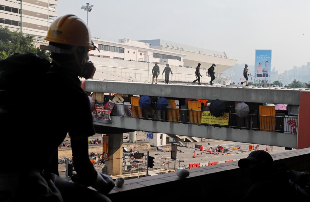 Hong Kong students arm themselves for showdown as police take breather