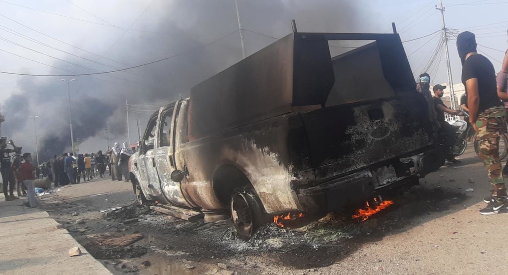Iraq protesters stay in streets as parliament prepares to remove PM