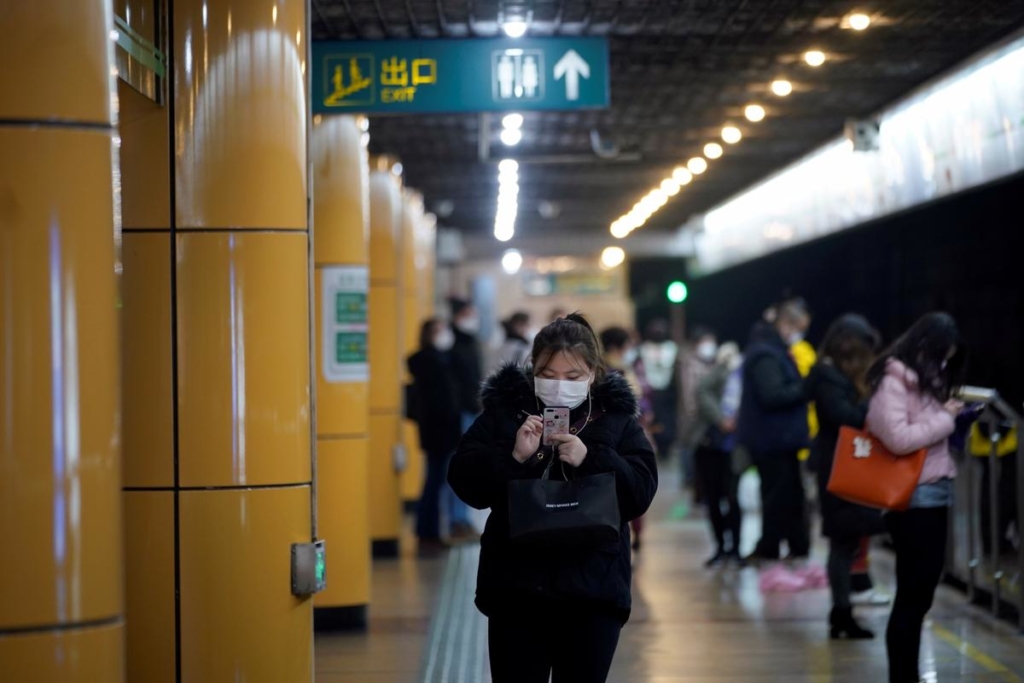 China says WHO chief against virus-related evacuations, as countries plan pull-outs