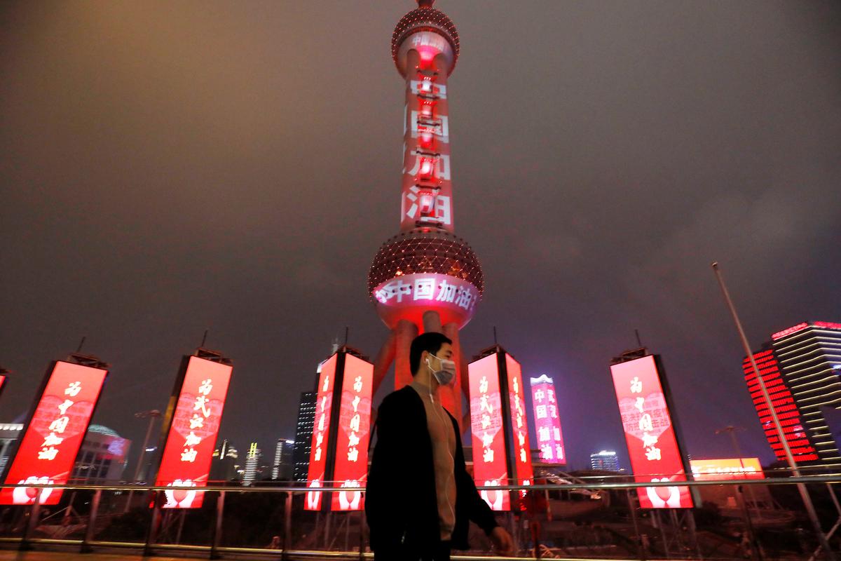 China’s coronavirus deaths surpass SARS as country plans halting return to work